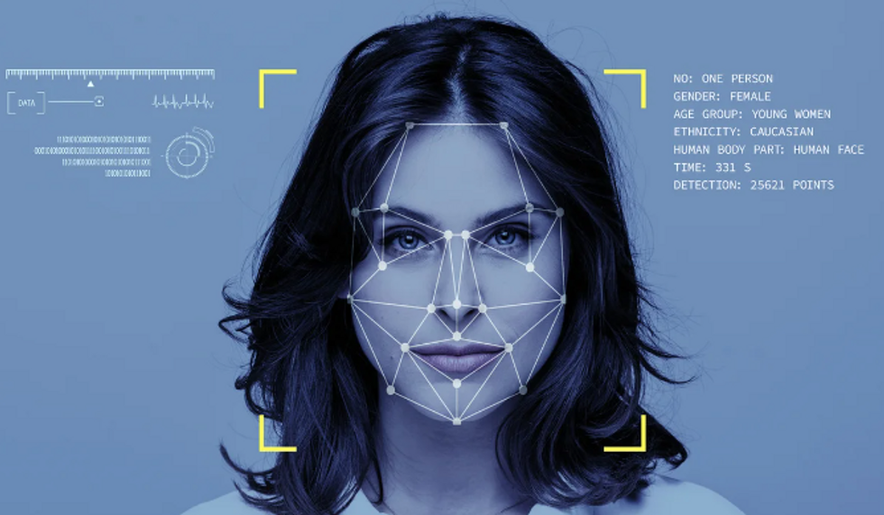 A woman with facial recognition data superimposed