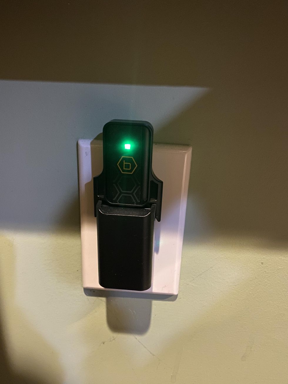 photo of Orbit B-hyve flood sensor hub in a socket
