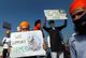 People hold placards during a nationwide strike to protest against newly passed farm bills, in Mumbai, India