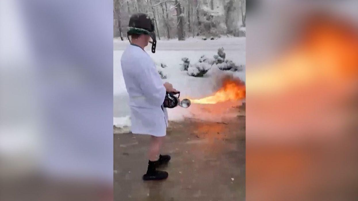 Kentucky man dressed as Cousin Eddie uses flamethrower to clear snow off driveway
