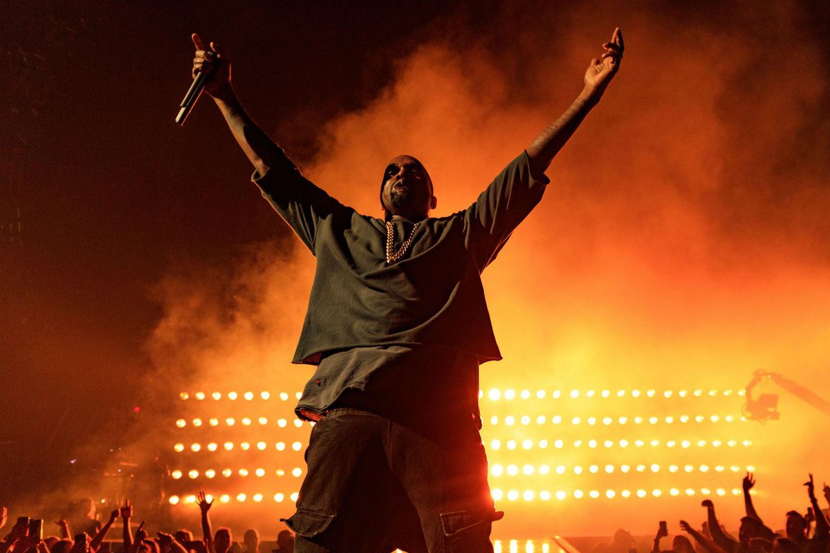 Kanye West performing on stage