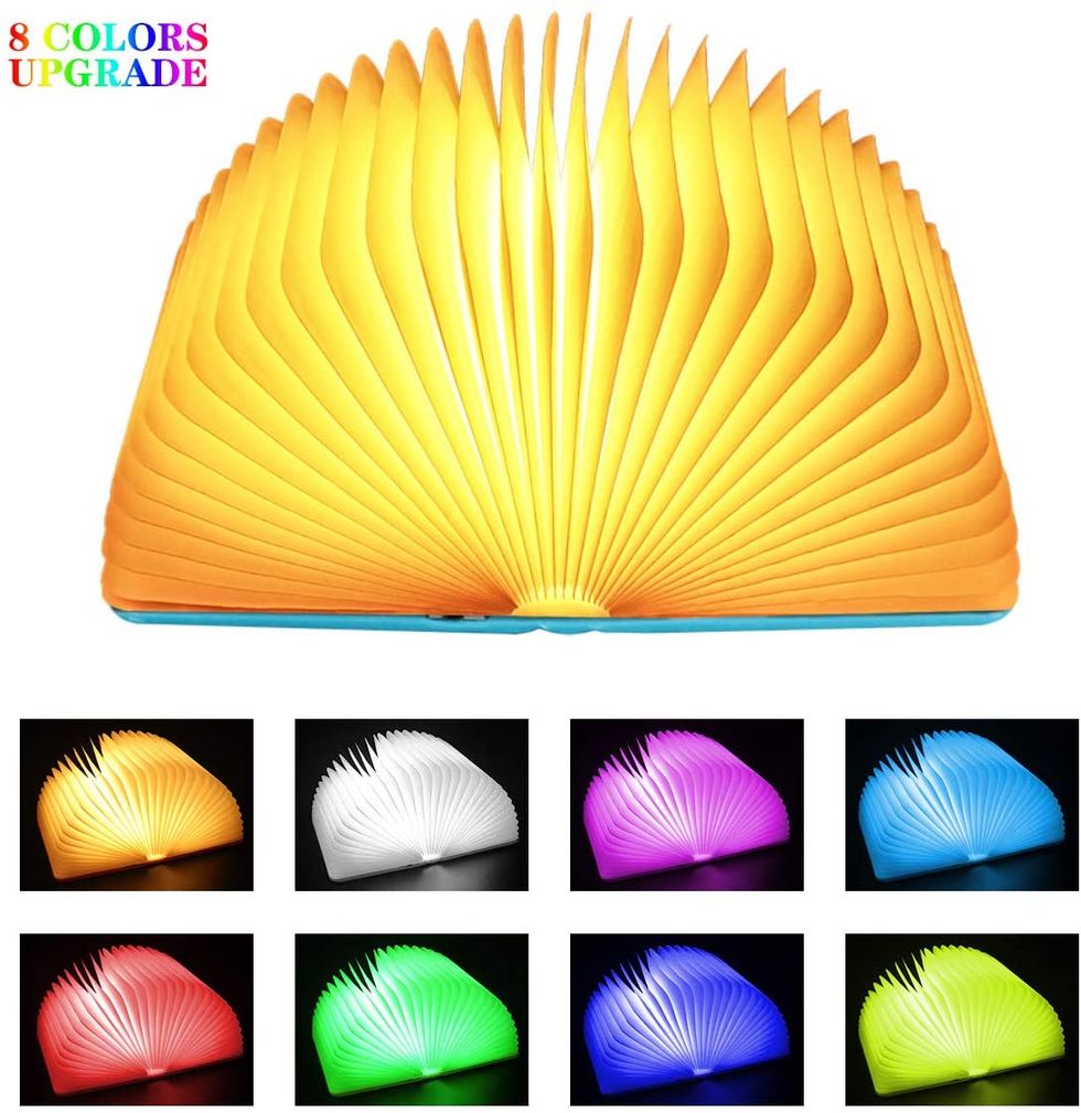 A lamp shaped like an open book that comes in a wide-range of colors.