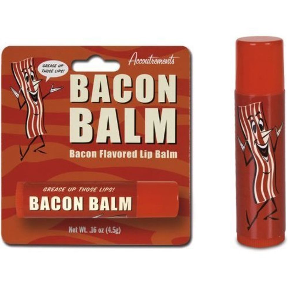 A stick and pack of bacon flavored lip balm.