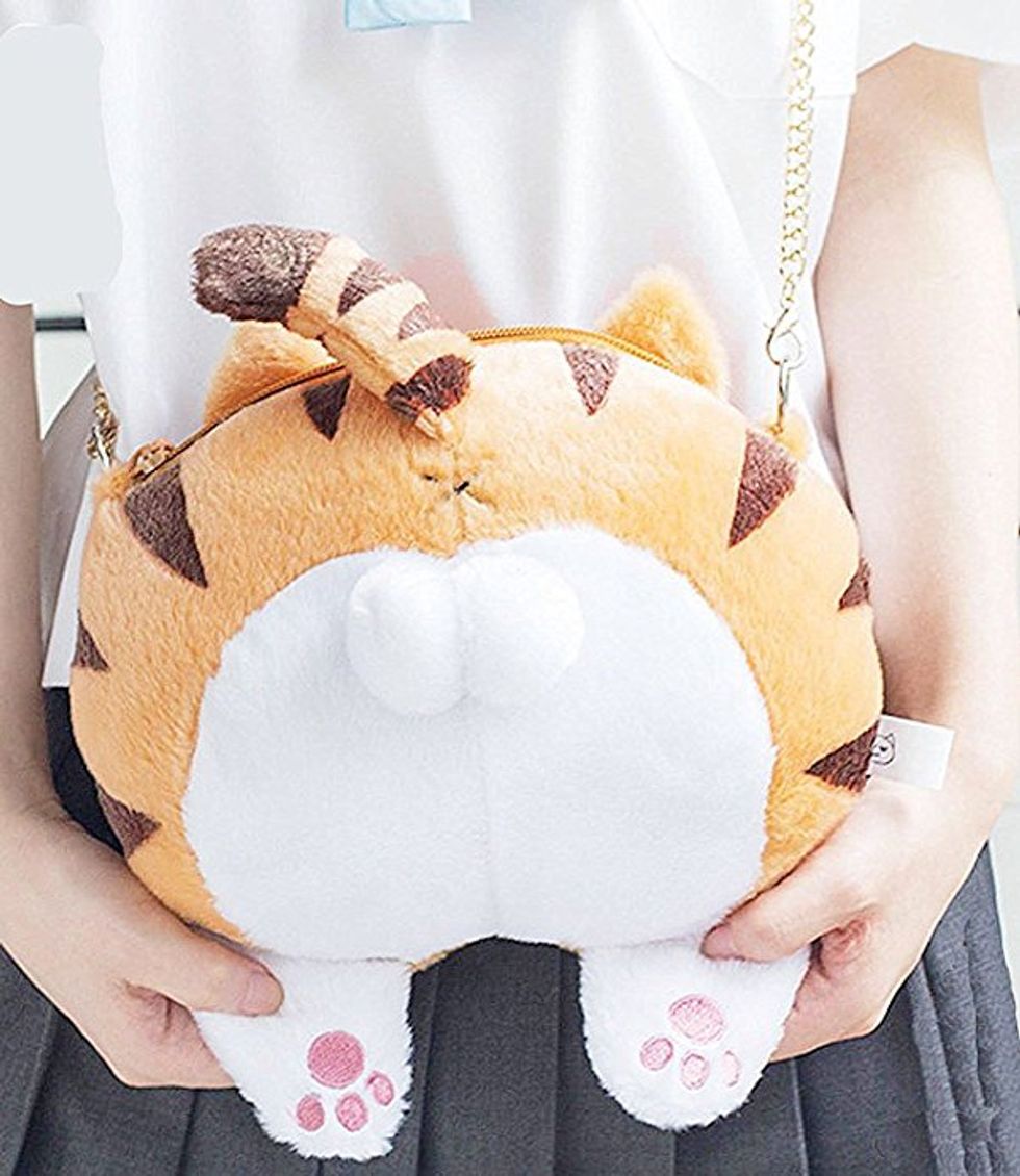 A purse the shape of a cat butt.