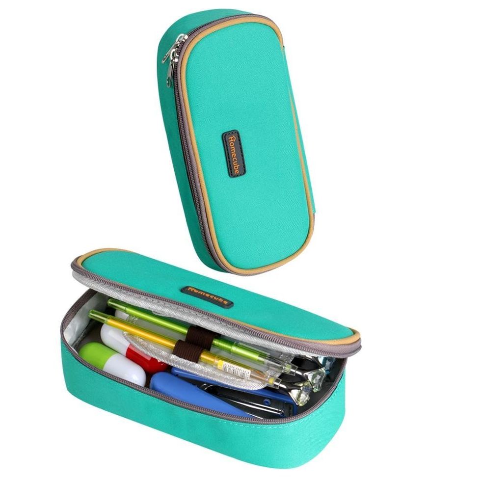 A blue pencil case full of pens.