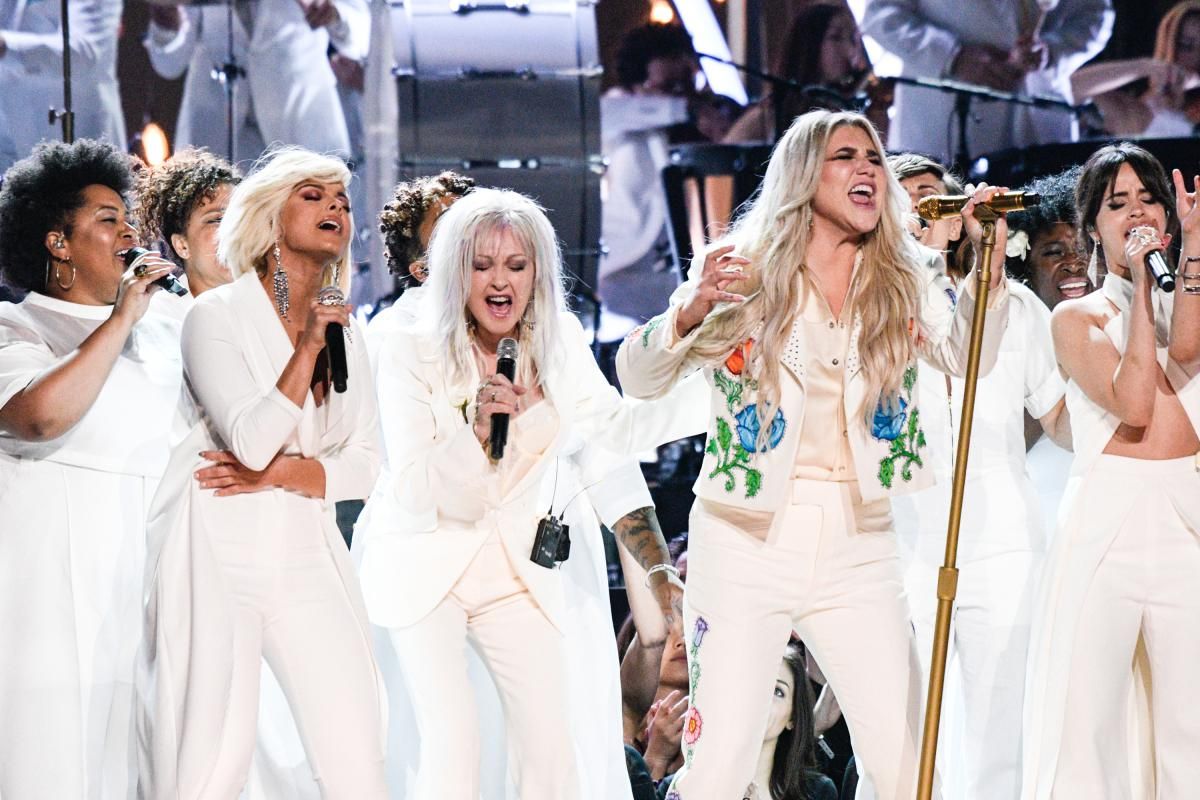 Kesha performing her song Praying with celebrity friends at the GRAMMYs