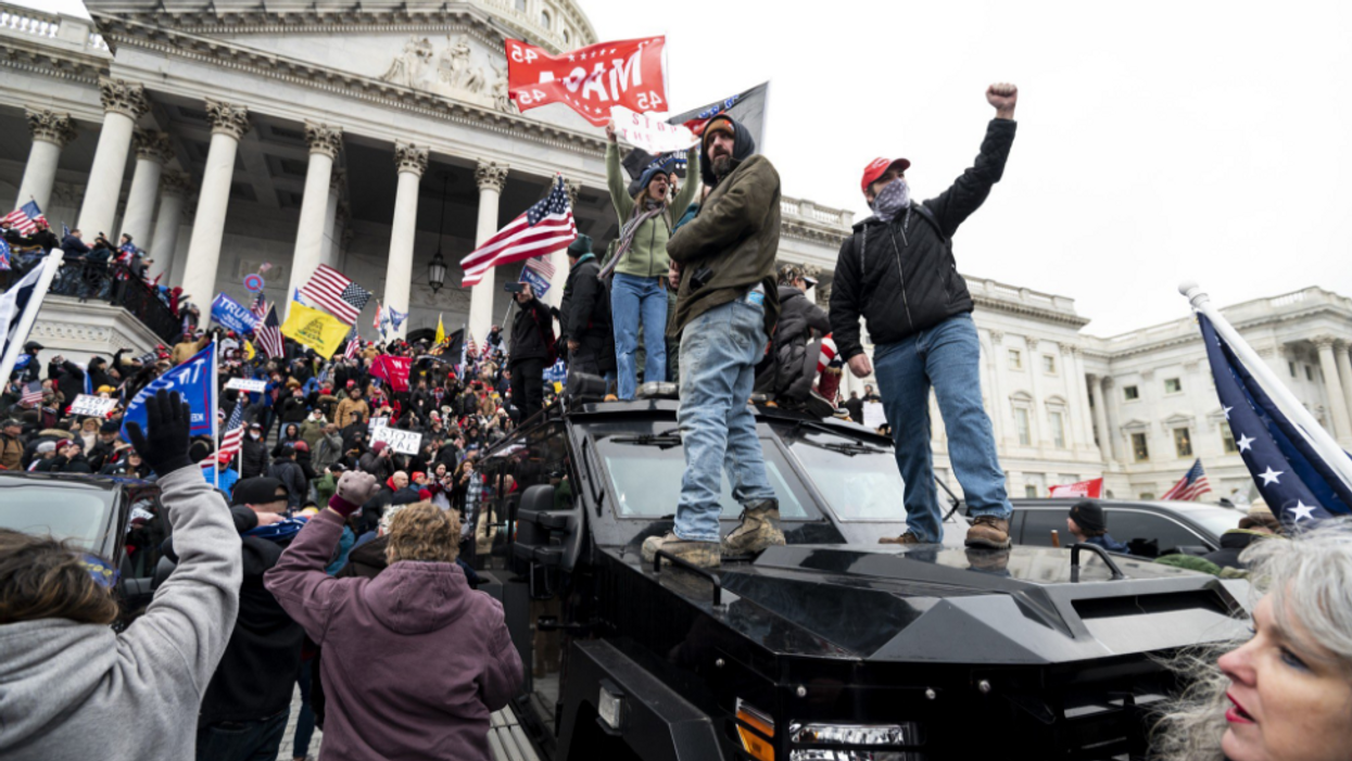 MAGA rioters storming the Capitol on Jan. 6