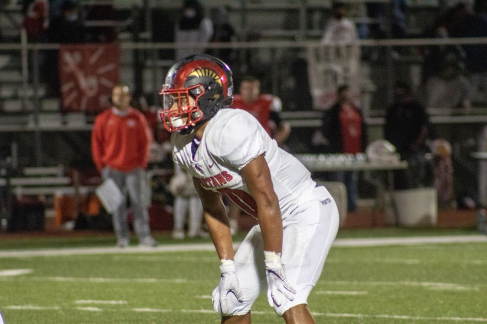 Josh Evans-Pickens, #10 waits for the ball to be in play in a game at Cleveland Stadium.