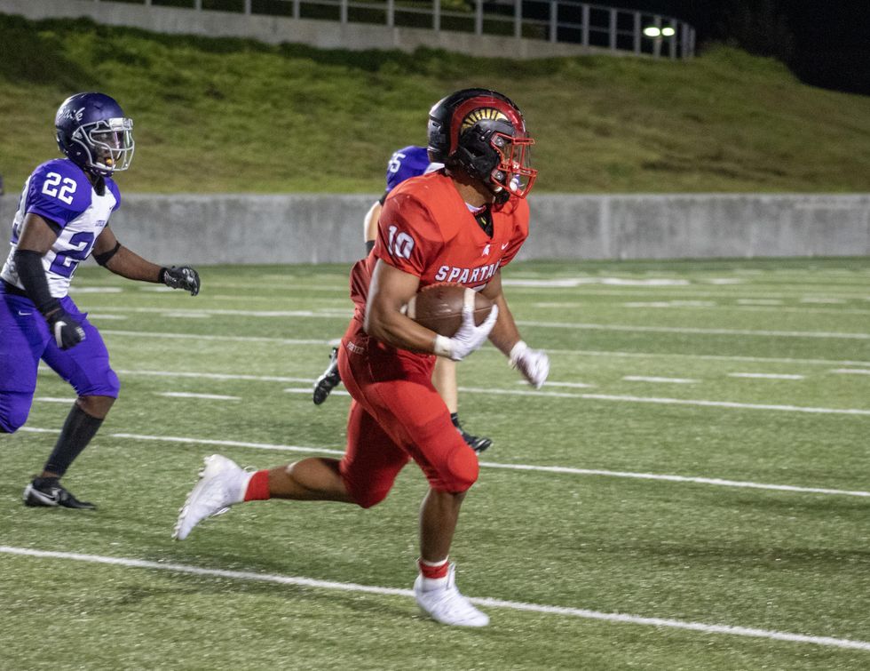 Josh Evans-Pickens, #10 runs with the ball in a district game against Lufkin.