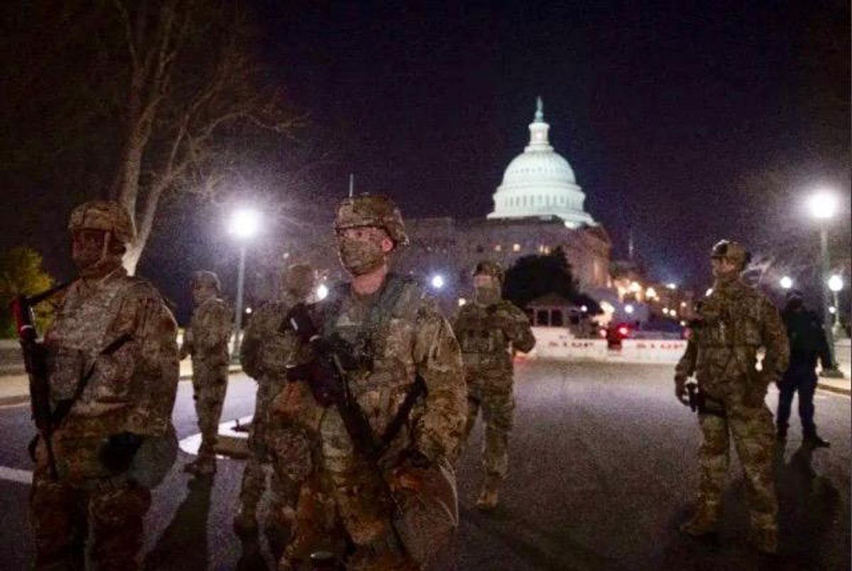 Troops on Washington streets to begin carrying arms