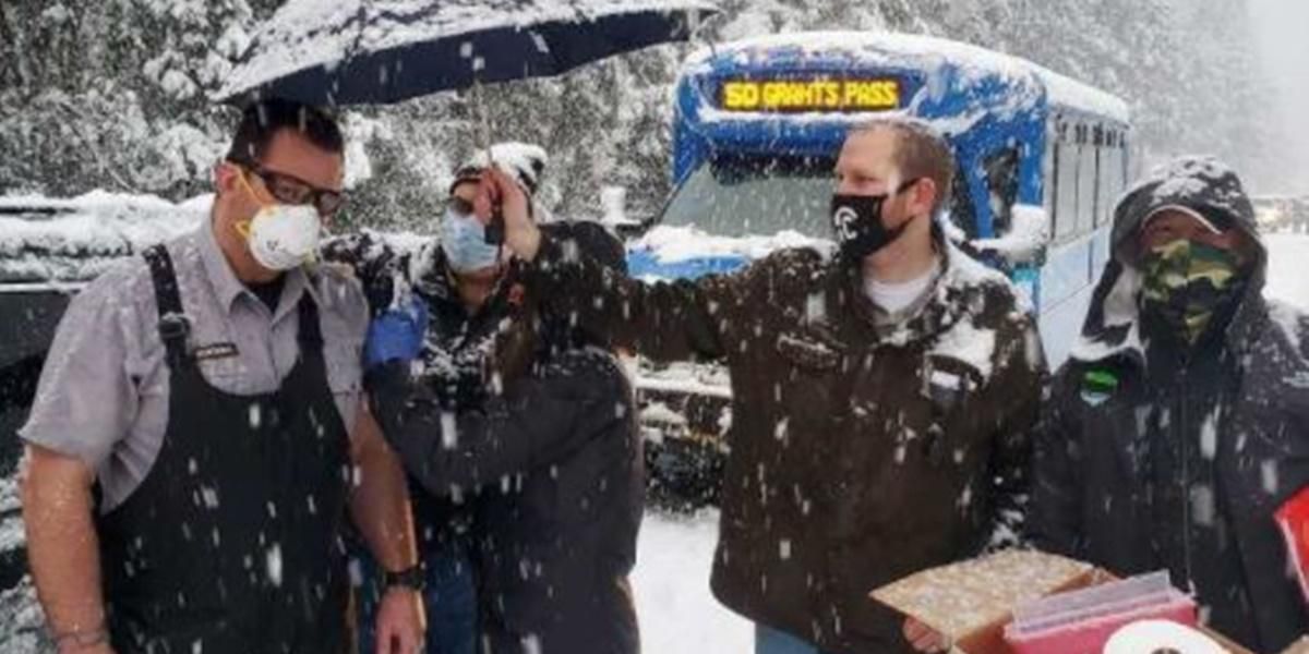 Oregon health workers get stuck in the snow and vaccinate random drivers while they wait