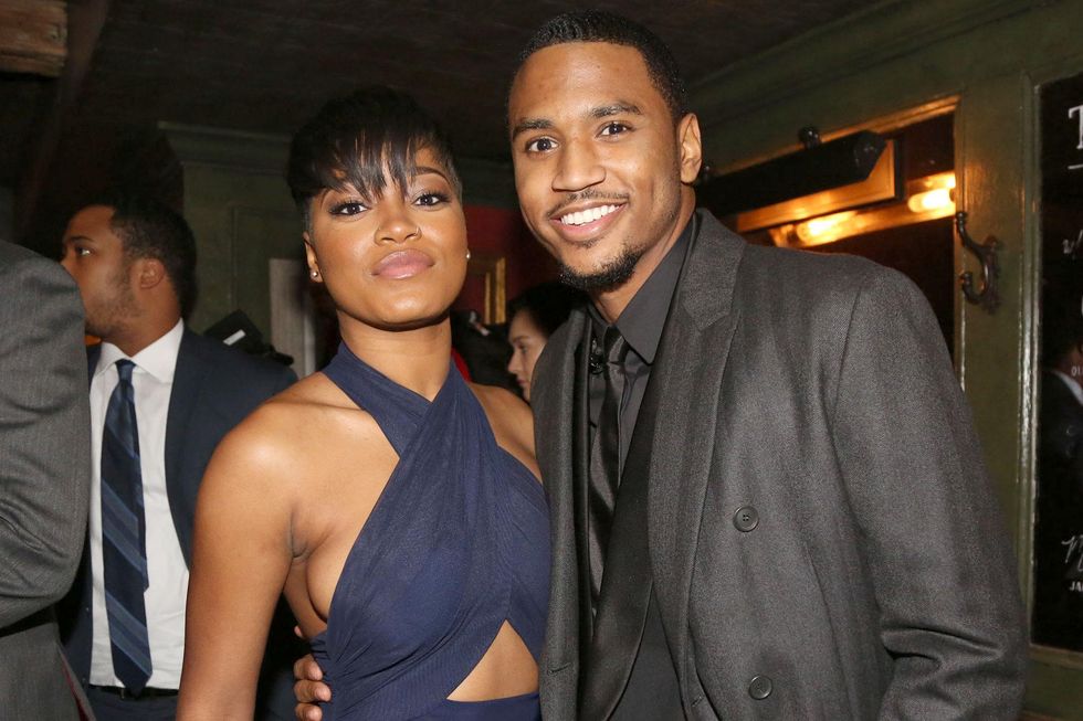 Trey Songz and Keke Palmer embracing at an event