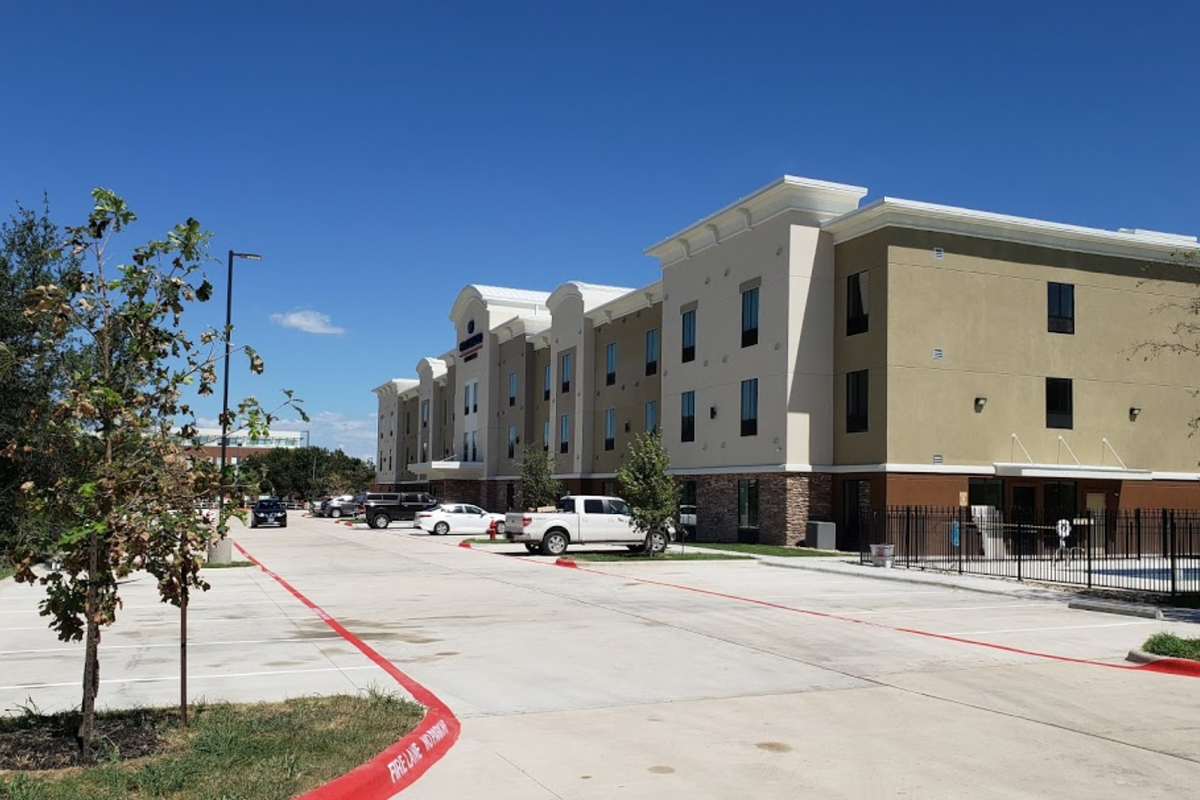 Neighbors protest the purchase of second hotel to house homeless