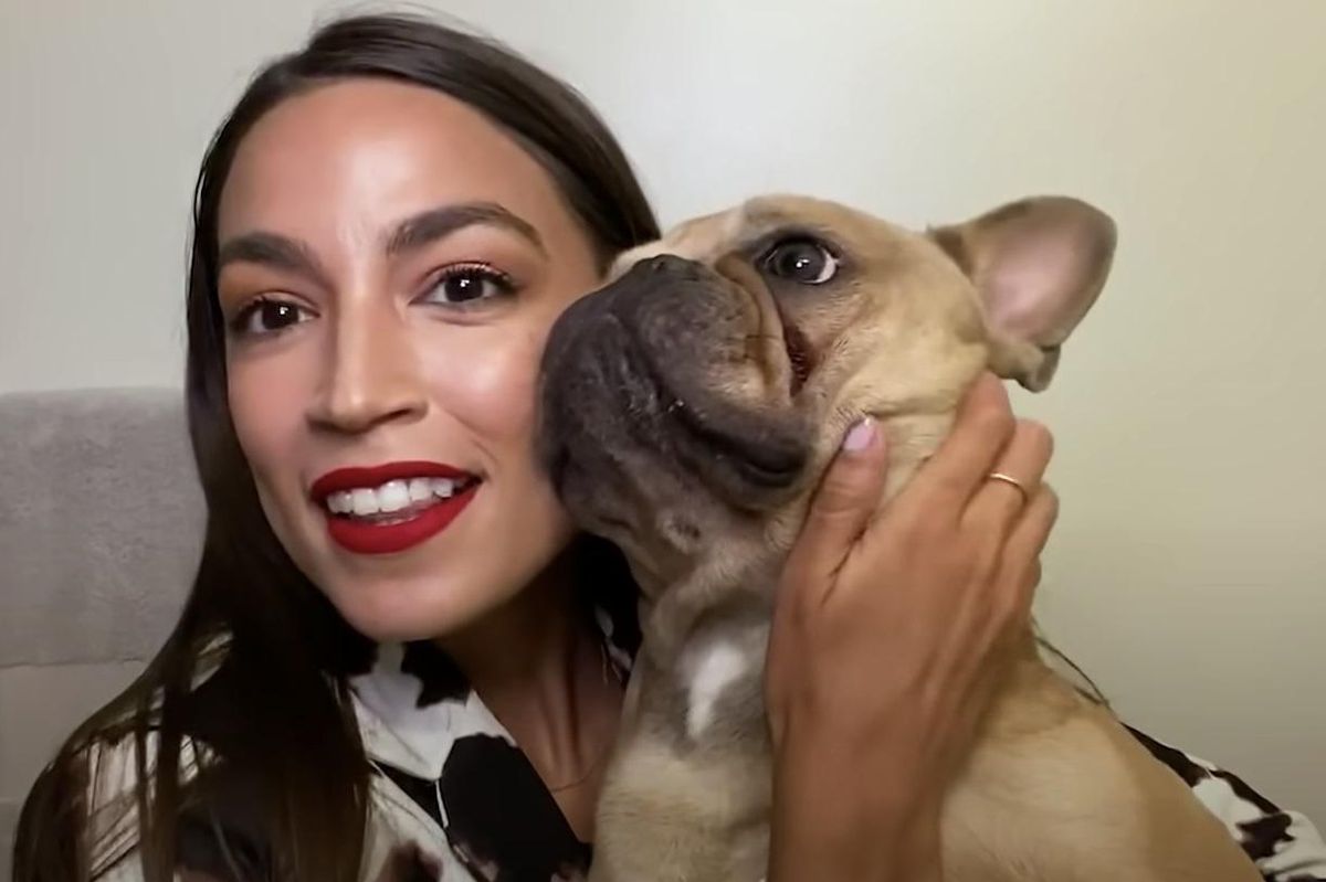 Representative Alexandria Ocasio-Cortez with her dog Deco