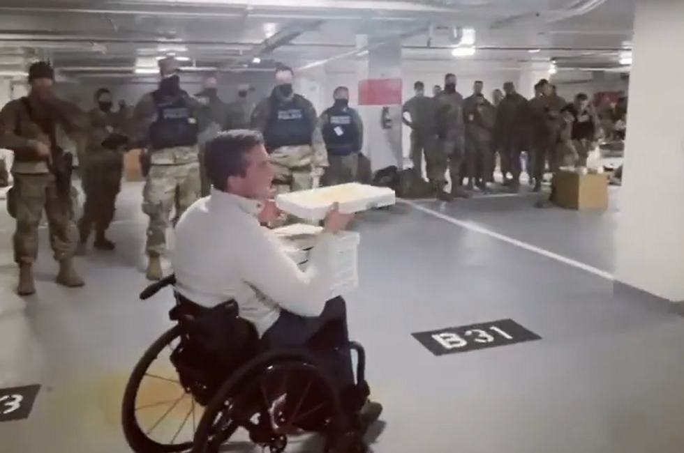 Rep. Madison Cawthorn delivers pizza to National Guard in parking garage, declares 'our troops deserve better'