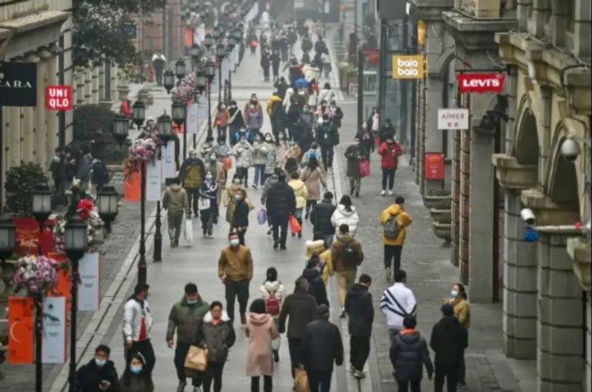 Wuhan marks a year since lockdown as Biden warns of 600,000 dead