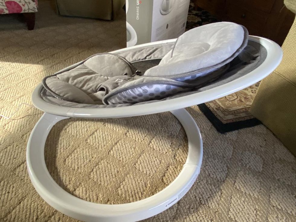 Side view of Munchkin swing