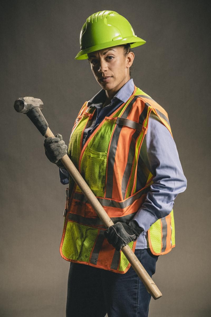 \u200bIraida Mujica holding a sledge hammer