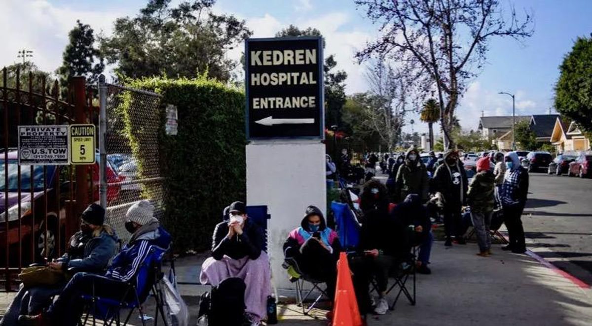 Los Angeles 'vaccine chasers' wait hours in hope of leftover doses