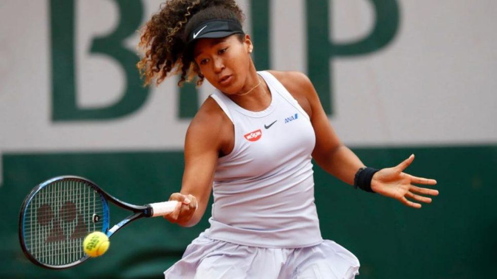 Naomi Osaka pauses during Australian Open match to save butterfly