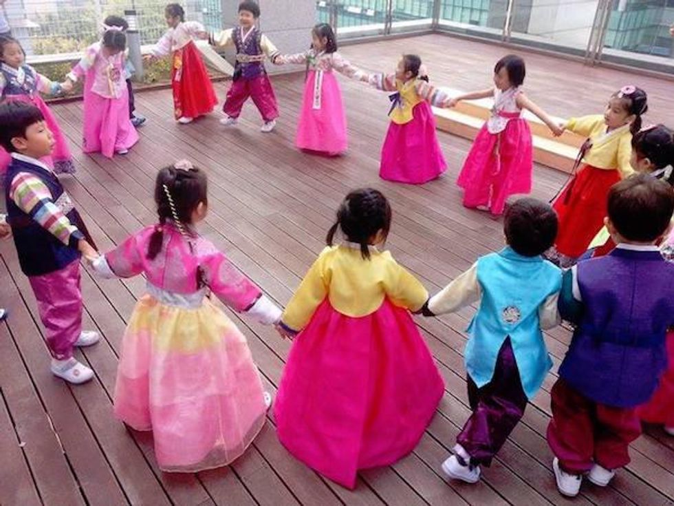 Children in Korea playing in traditional clothes