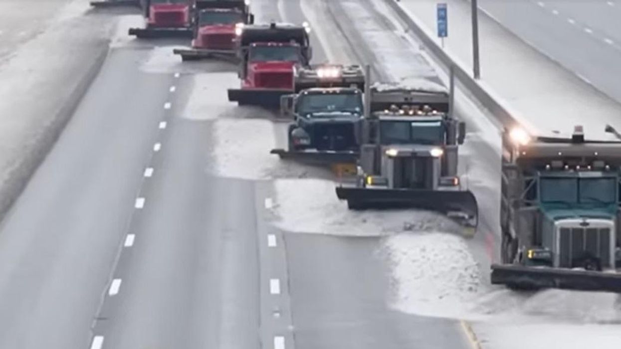 Synchronized snowplowing in Kentucky hypnotizes with its symmetry