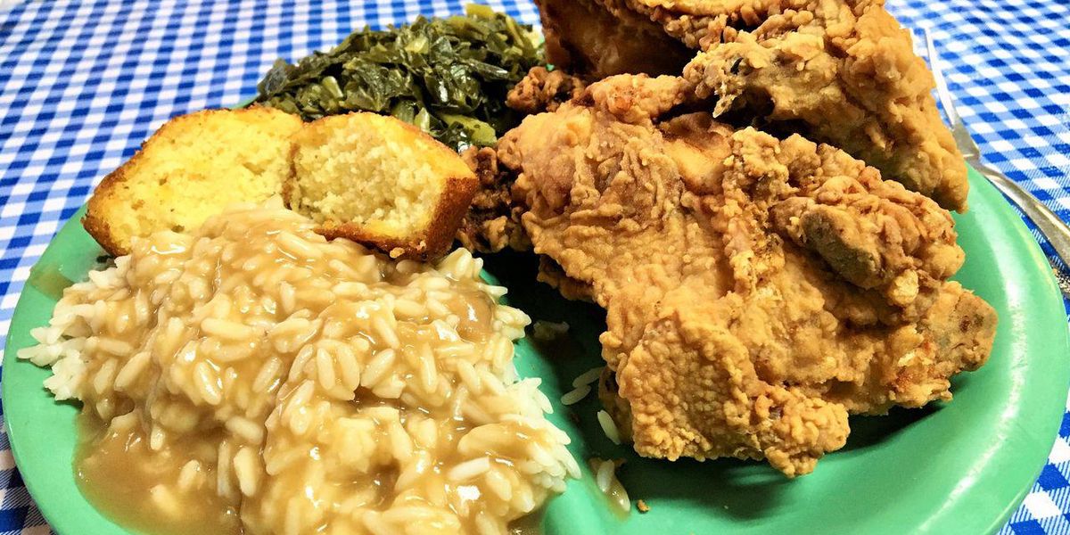 Southern mom preparing a homemade meal with a variety of fresh ingredients