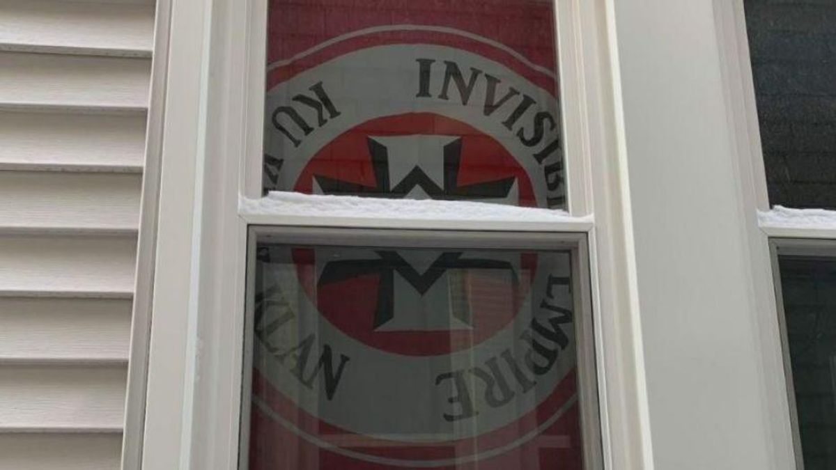 Community shocked as Michigan man displays KKK flag in window facing Black neighbor's house