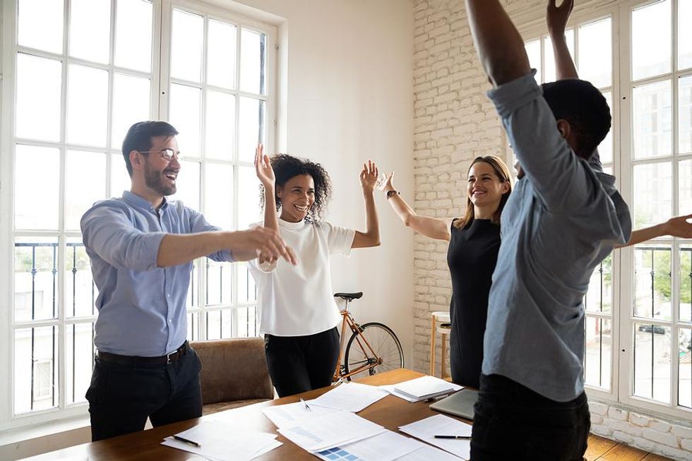 Proactive employees celebrate their success