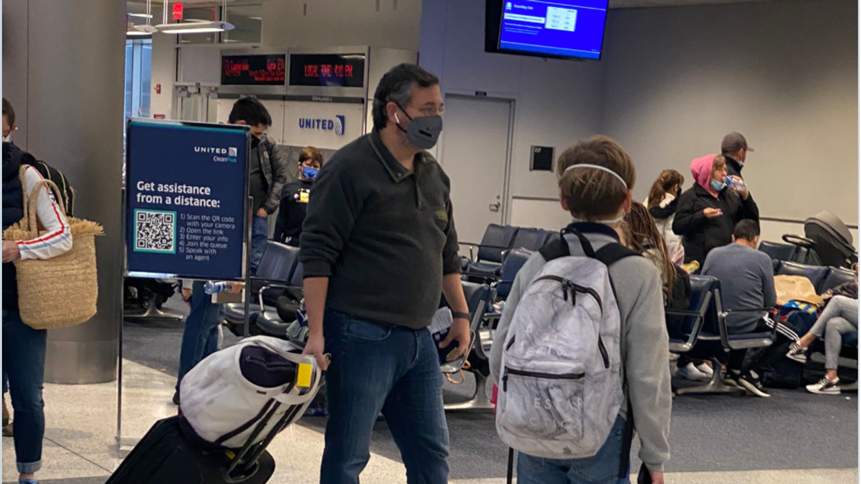 Sen. Ted Cruz preparing to board a flight to Cancun in Huston as his state of Texas faces the aftermath of a severe winter storm.