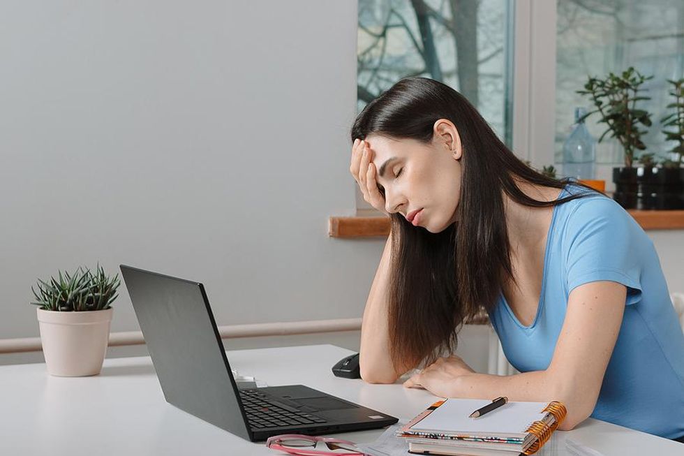 Unemployed woman stressed about finding a job