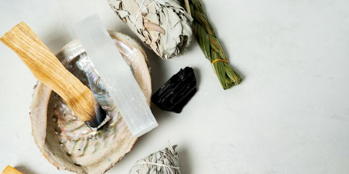 The Hella Lit Benefits Of Adding Palo Santo To Your Wellness Practice