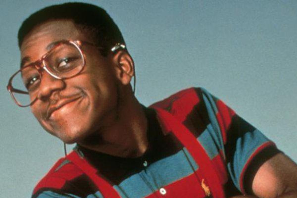 Steve Urkel smilling with his head tilted