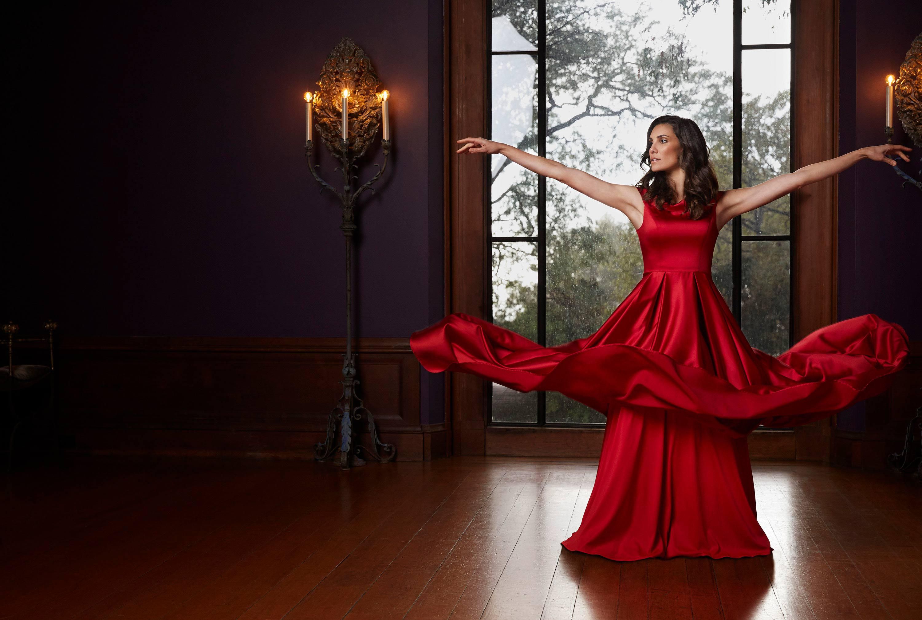 Daniela Ruah in a red gown