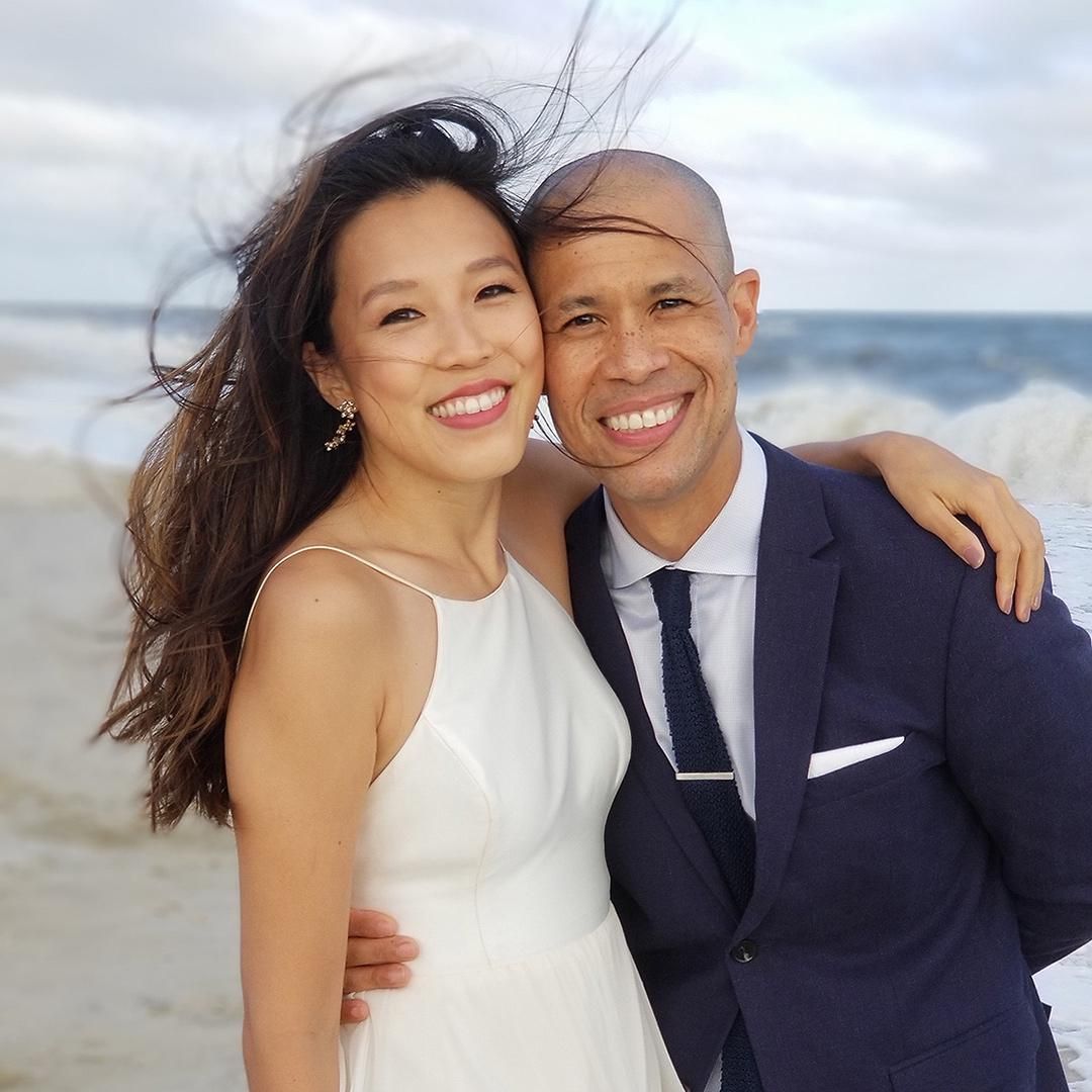 CBS News correspondent Vladimir Duthiers and Marian Wang on the beach at their wedding