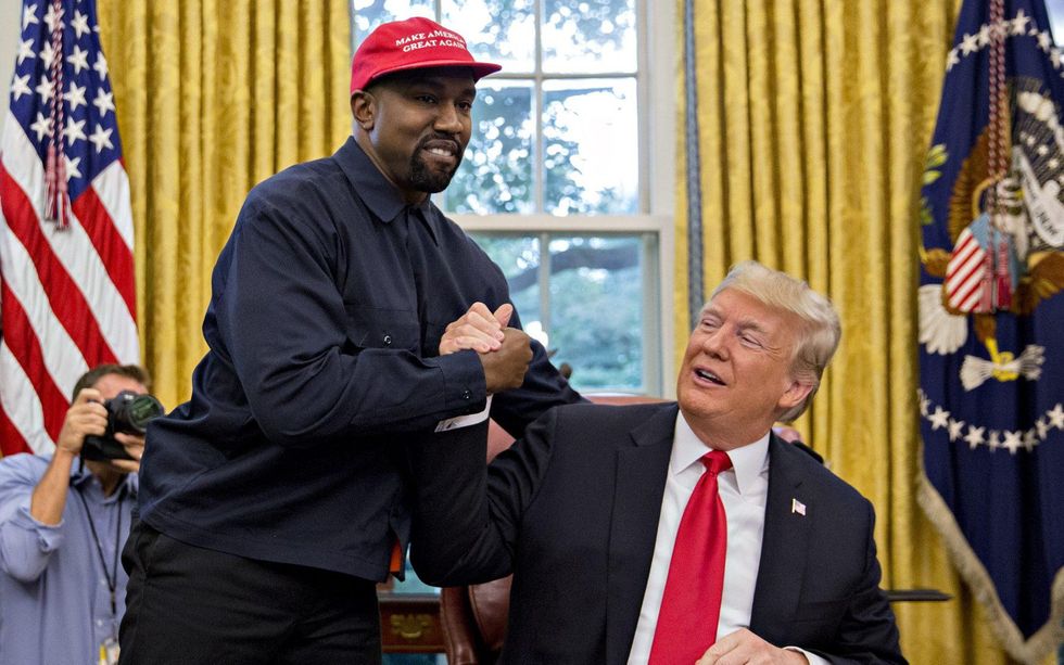 Kanye West Shaking hands with Former President Trump
