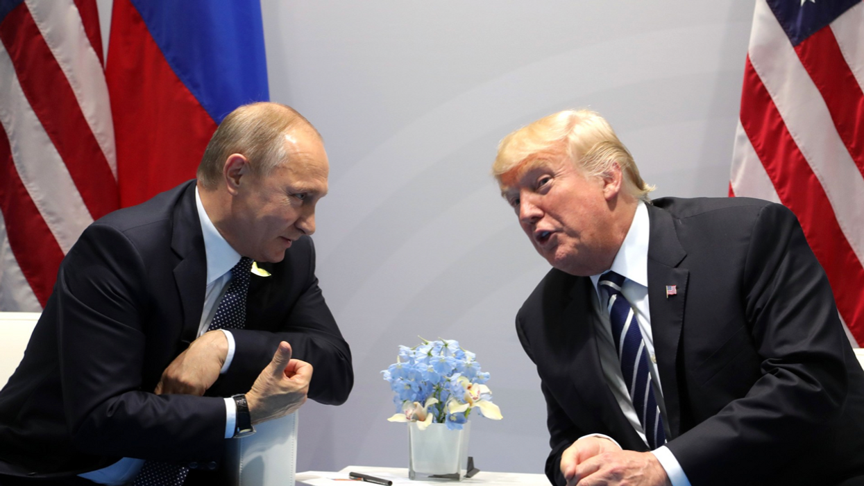 ​"File:Vladimir Putin and Donald Trump at the 2017 G-20 Hamburg Summit (4).jpg"