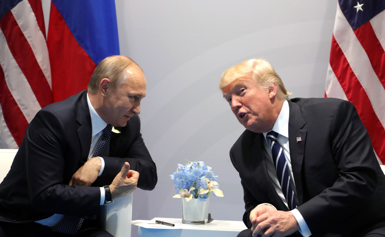 ​"File:Vladimir Putin and Donald Trump at the 2017 G-20 Hamburg Summit (4).jpg"