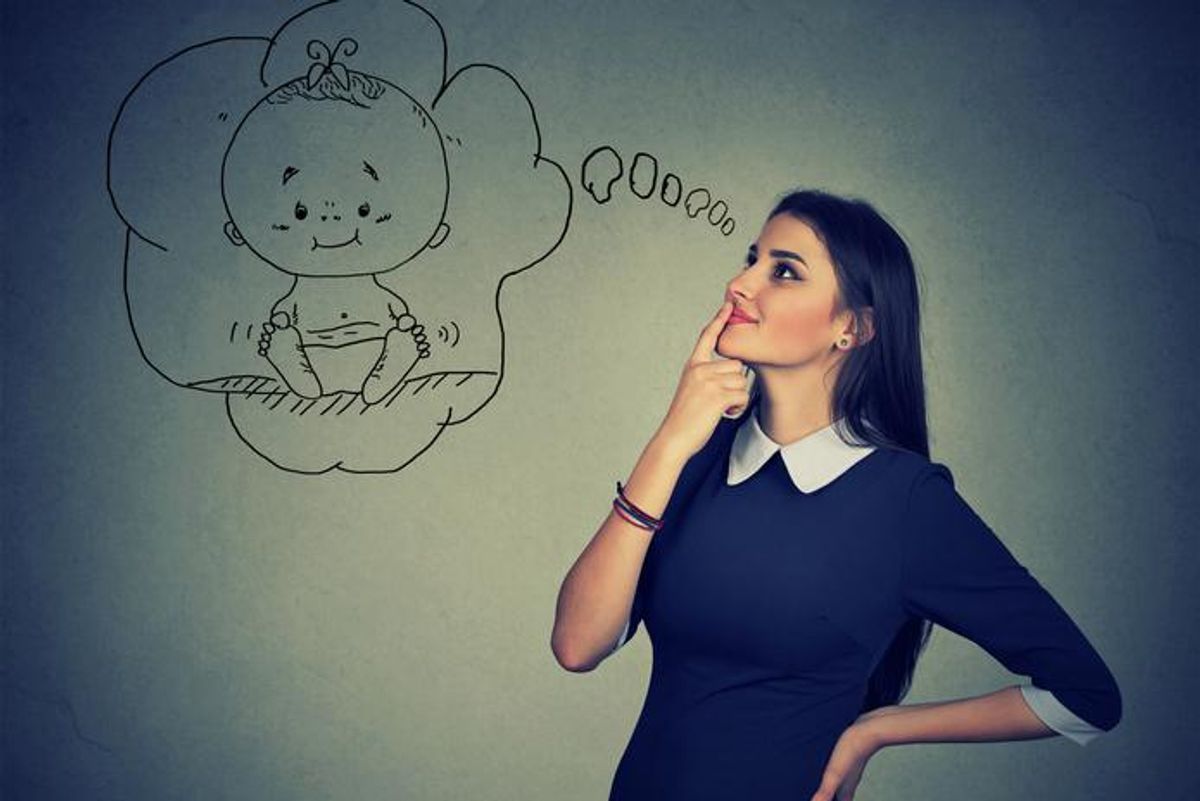 A woman thinking about having a baby