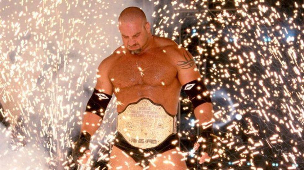 Goldberg wearing the WCW title during his pyro filled entrance