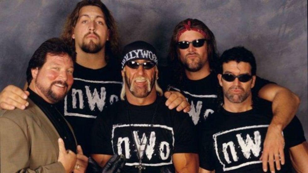 The NWO posing and smiling during a photo shoot