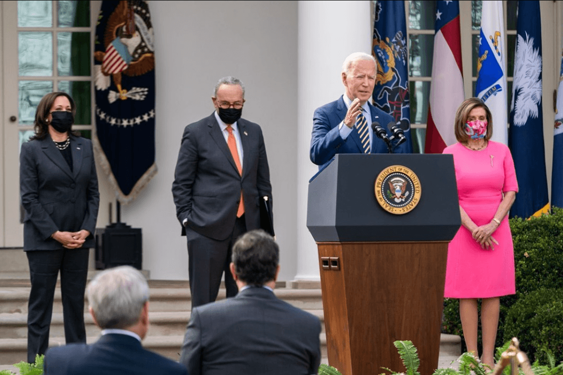 President Biden speaking in front of VP Harris, Sen. Majority Leader Chuck Schumer and House Speaker Nancy Pelosi.