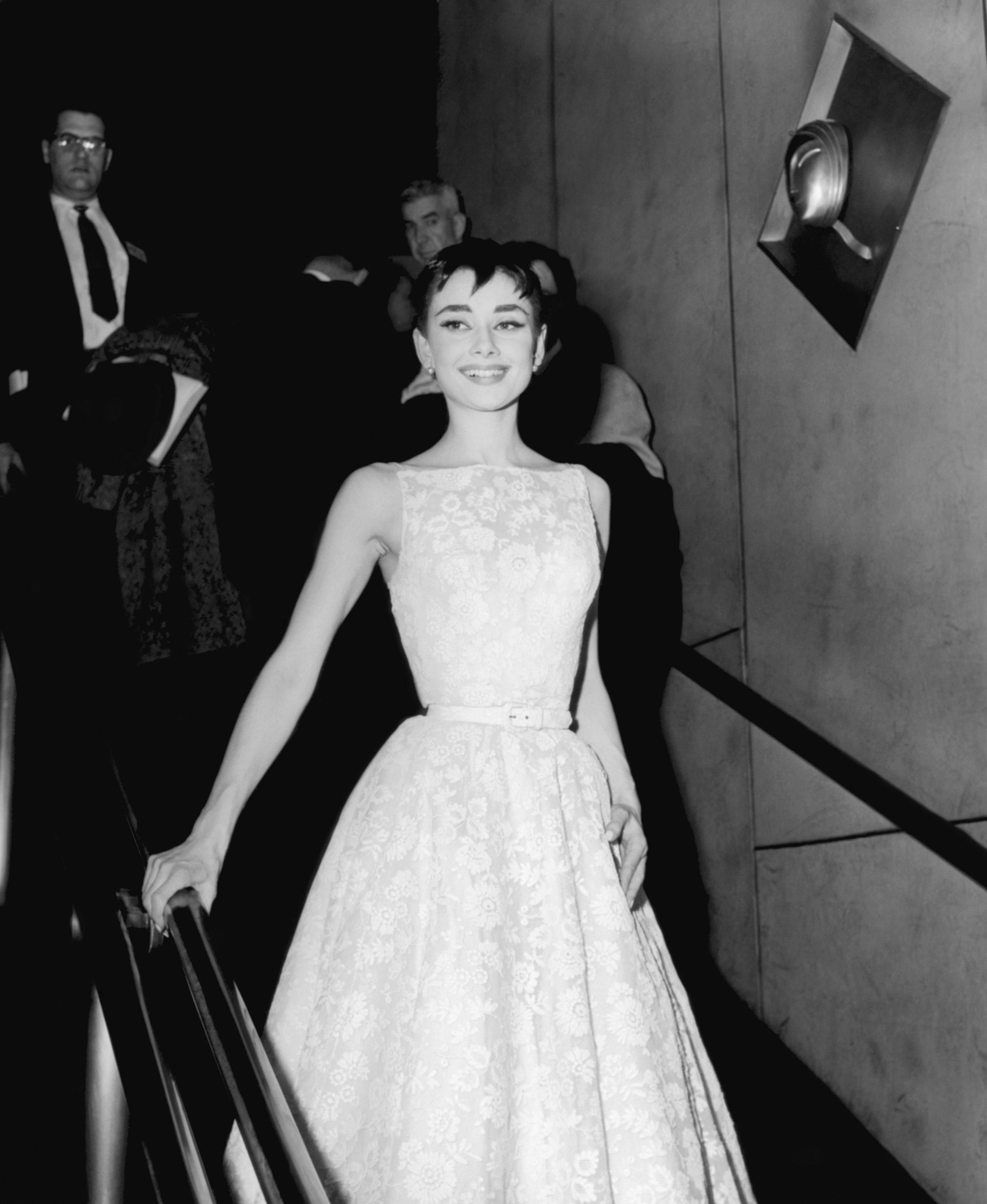 Audrey Hepburn in a white floral Givenchy dress at the Oscars in 1954