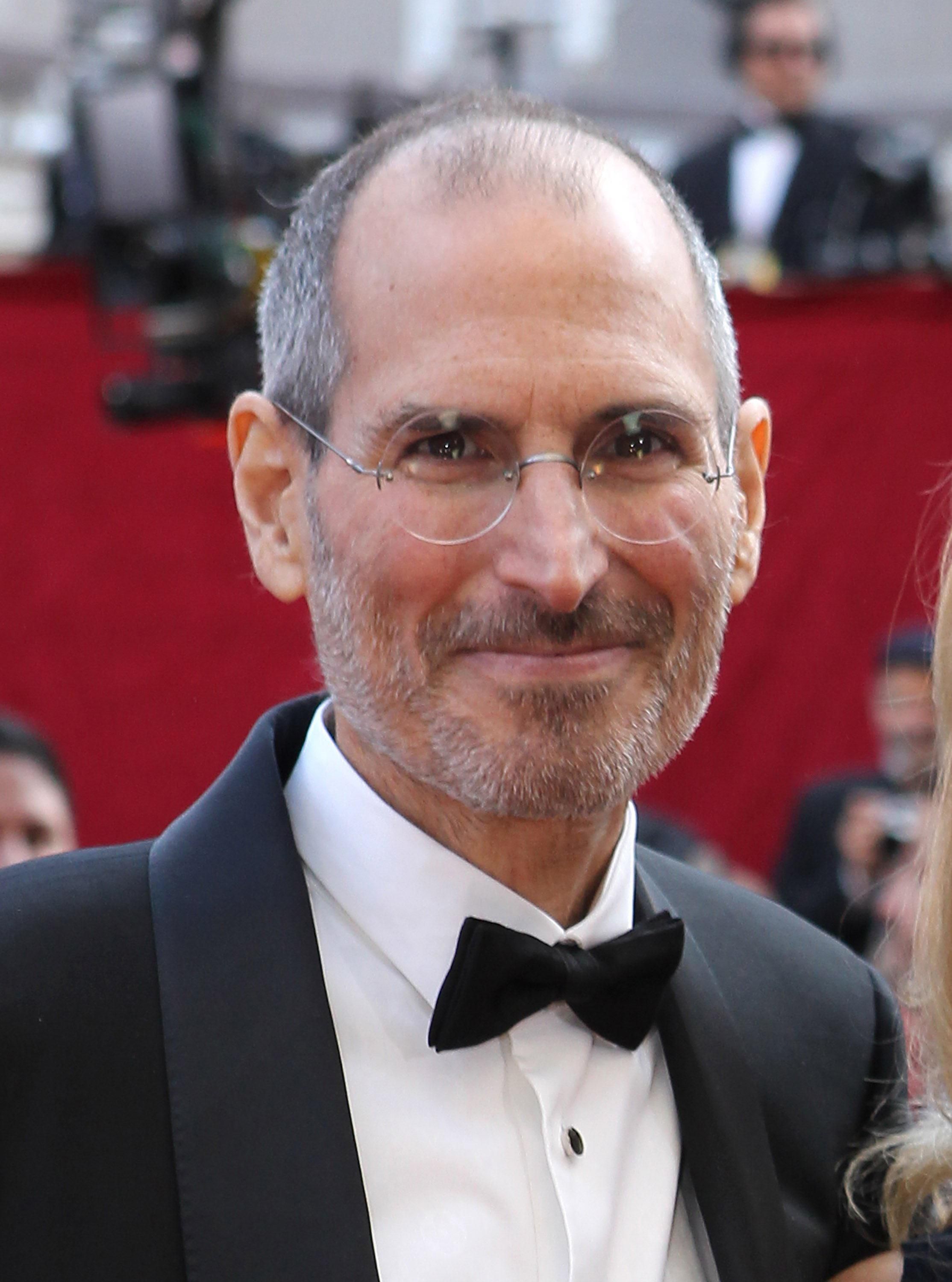 Steve Jobs in black tie on the red carpet
