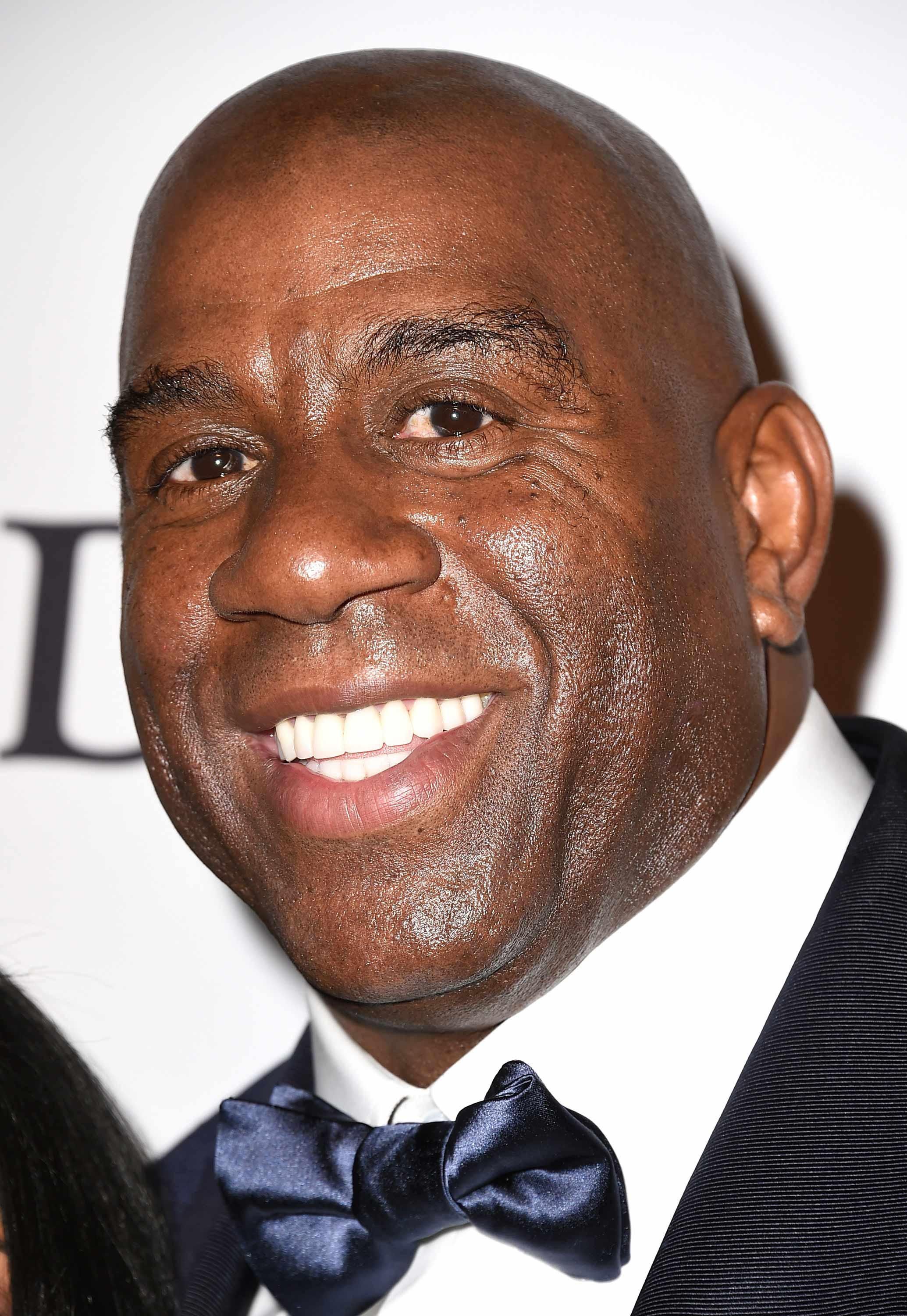 NBA champ and GRAMMY winner Magic Johnson in black tie