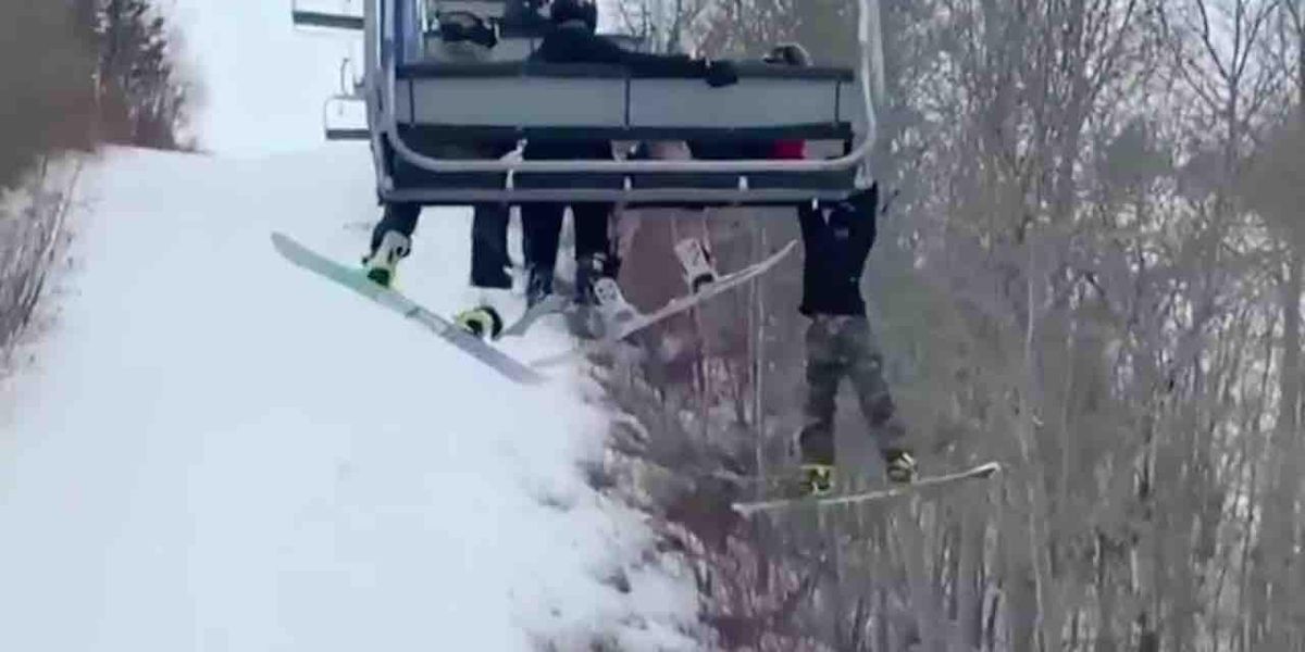 VIDEO: The boy slides off the cable car, grabs the ledge, swings above the slopes – and all the witnesses can do is shout for him to hold on