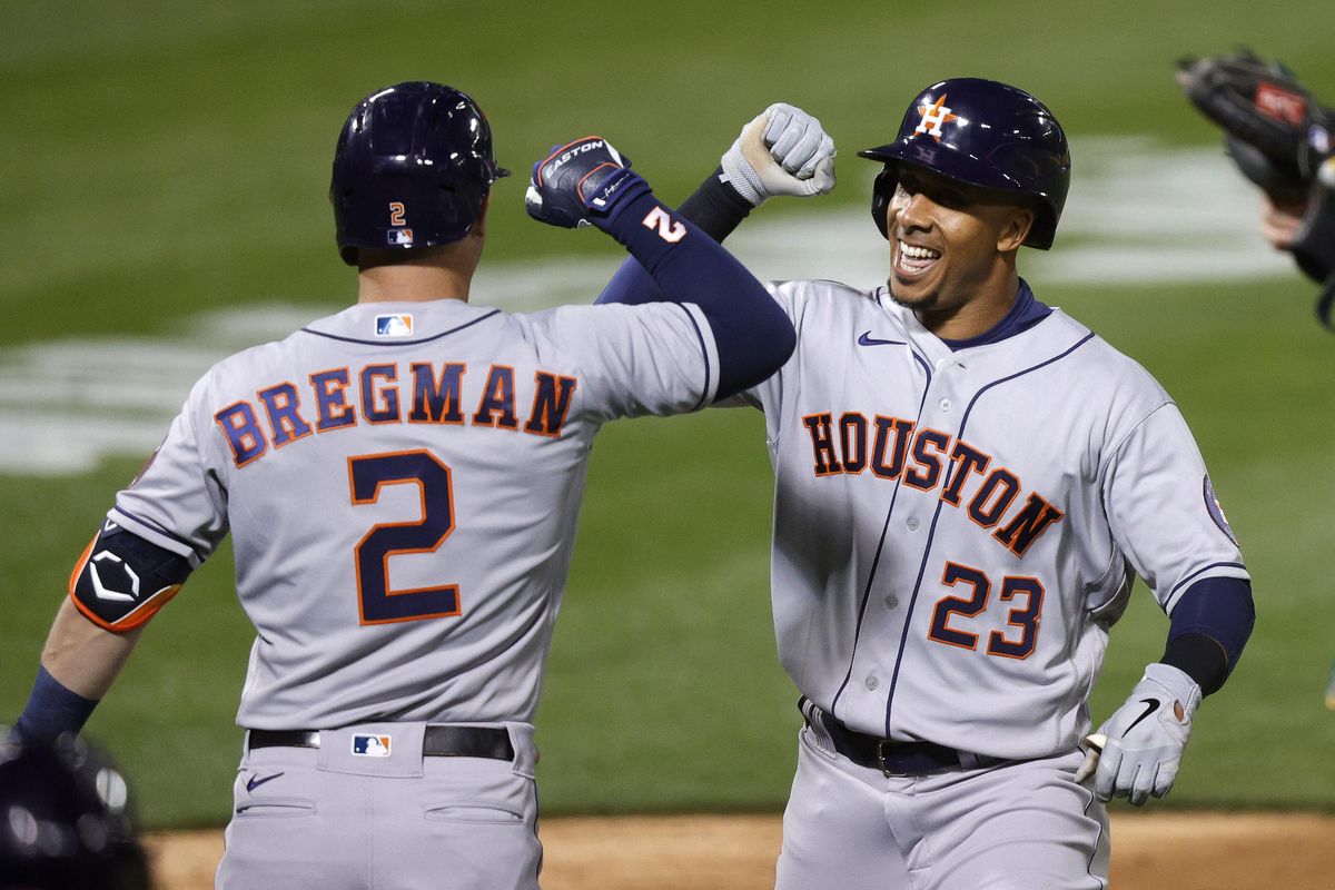 Alex Bregman and Michael Brantley of the Astros celebrating