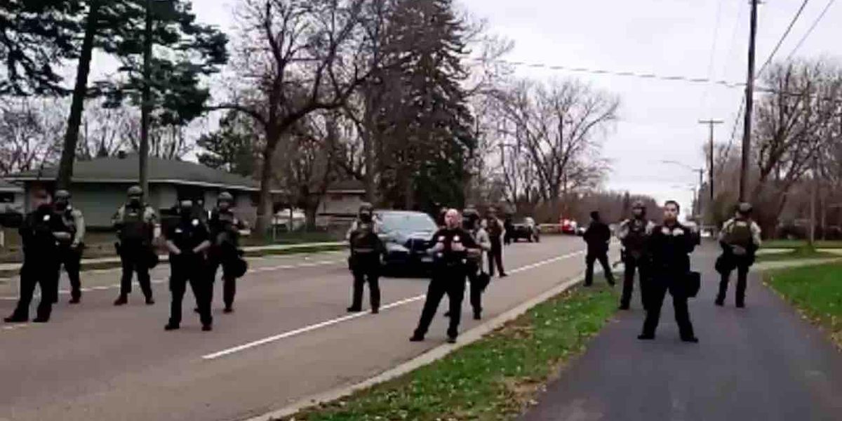Anti-cop protester on bullhorn urges crowd to dox Minneapolis police, post photos of their families — and 'start doin' pull ups to their house'