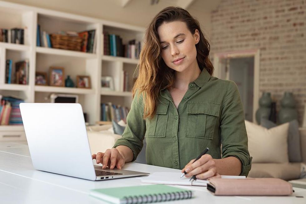 Woman working remotely for her green job
