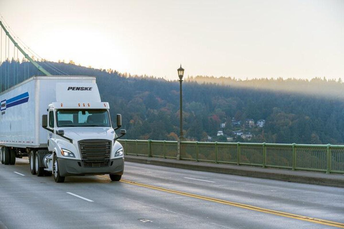 Penske truck on bridge